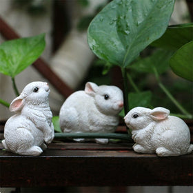 TaTalife resin garden rabbit statues weather-resistant for year-round outdoor use.