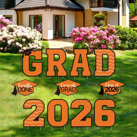 Tatuo graduation yard sign set on front lawn for Class of 2026.