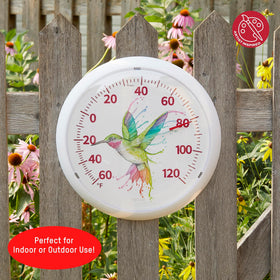 Taylor Rainbow Hummingbird dial thermometer wall-mounted for indoor-outdoor display.