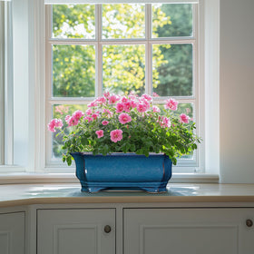 Outdoor-ready Teagas ceramic planter with retro blue glaze