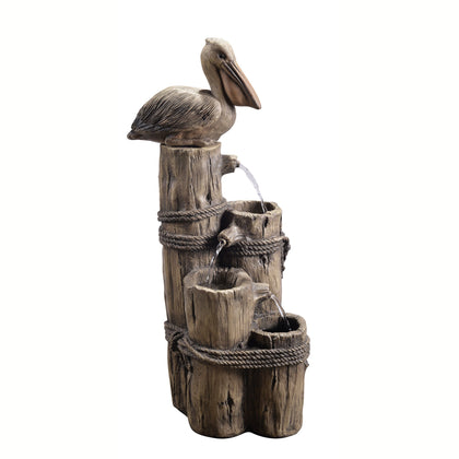 Teamson Home Nautical fountain pelican detail enhances outdoor ambiance with a soothing water display.