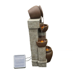 Teamson Home solar-powered LED lights illuminate the feature at night with soft glow.