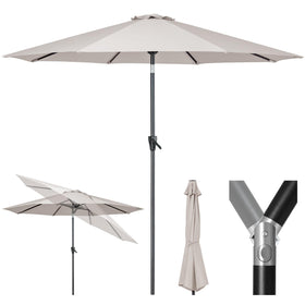 Tempera outdoor umbrella assembly in a garden for quick shade