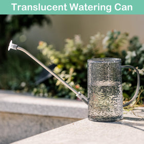Tennedriv Green 2-in-1 watering tool for targeted pours and gentle showers.
