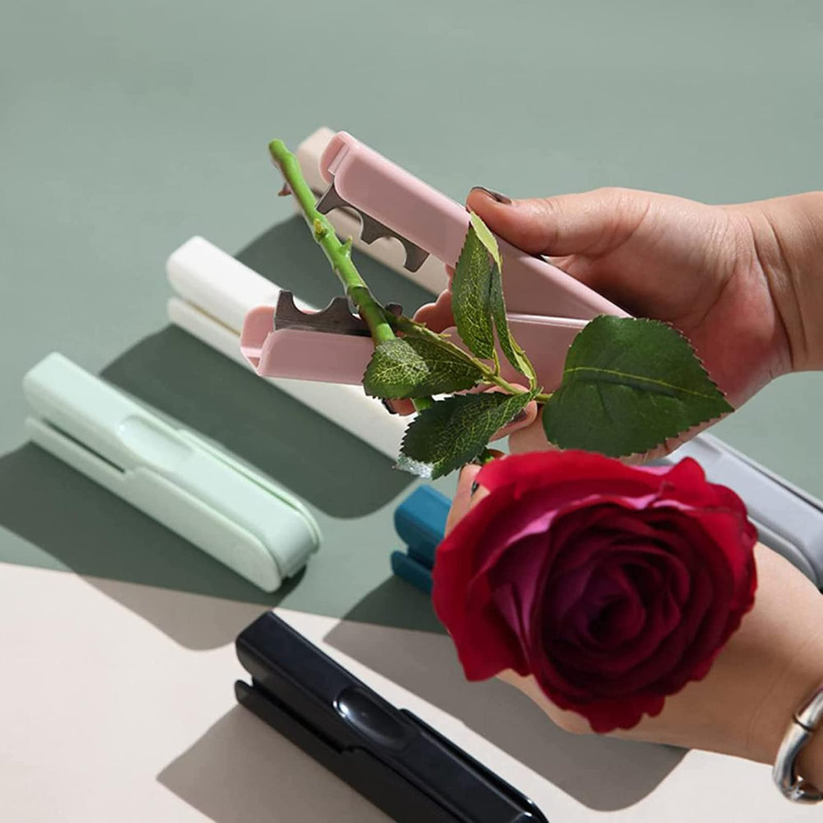 Pink TEONEI thorn remover tool makes gift-ready flower arrangements