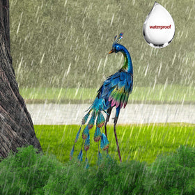 Teresa's Collections blue peacock garden decor enhances porch or patio ambiance.