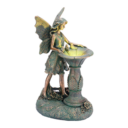 TERESA'S COLLECTIONS fairy garden statue with solar light adds magical nighttime ambiance to outdoor spaces.