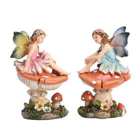 TERESA'S COLLECTIONS fairy sitting on mushrooms decor enhances outdoor whimsy