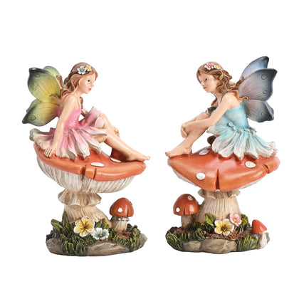 TERESA'S COLLECTIONS fairy sitting on mushrooms decor enhances outdoor whimsy