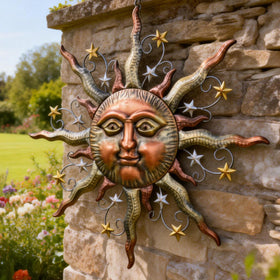 Teresa's sun wall decor brightens fences and patios with rustic, timeless appeal.