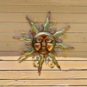 TERESA'S outdoor sun wall art complements patios and entryways beautifully.