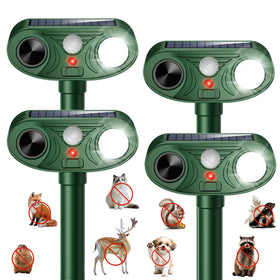 Thcritter ultrasonic solar animal repellent in outdoor setup deters garden pests.