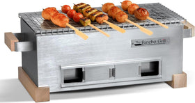 The Bincho Grill 16-inch mini yakitori grill with stainless steel body delivering even heat for skewers.
