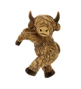 The Bridge Collection Highland Cow pot hanger adds personality to balcony planters.