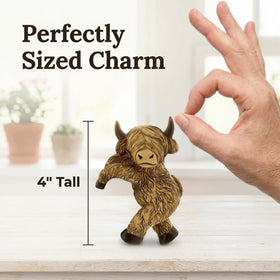 The Bridge Collection Highland Cow pot hanger in weather-resistant resin for outdoor use.