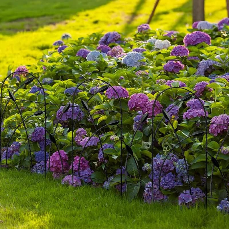 Thealyn black fence border in outdoor scene blends with greenery.