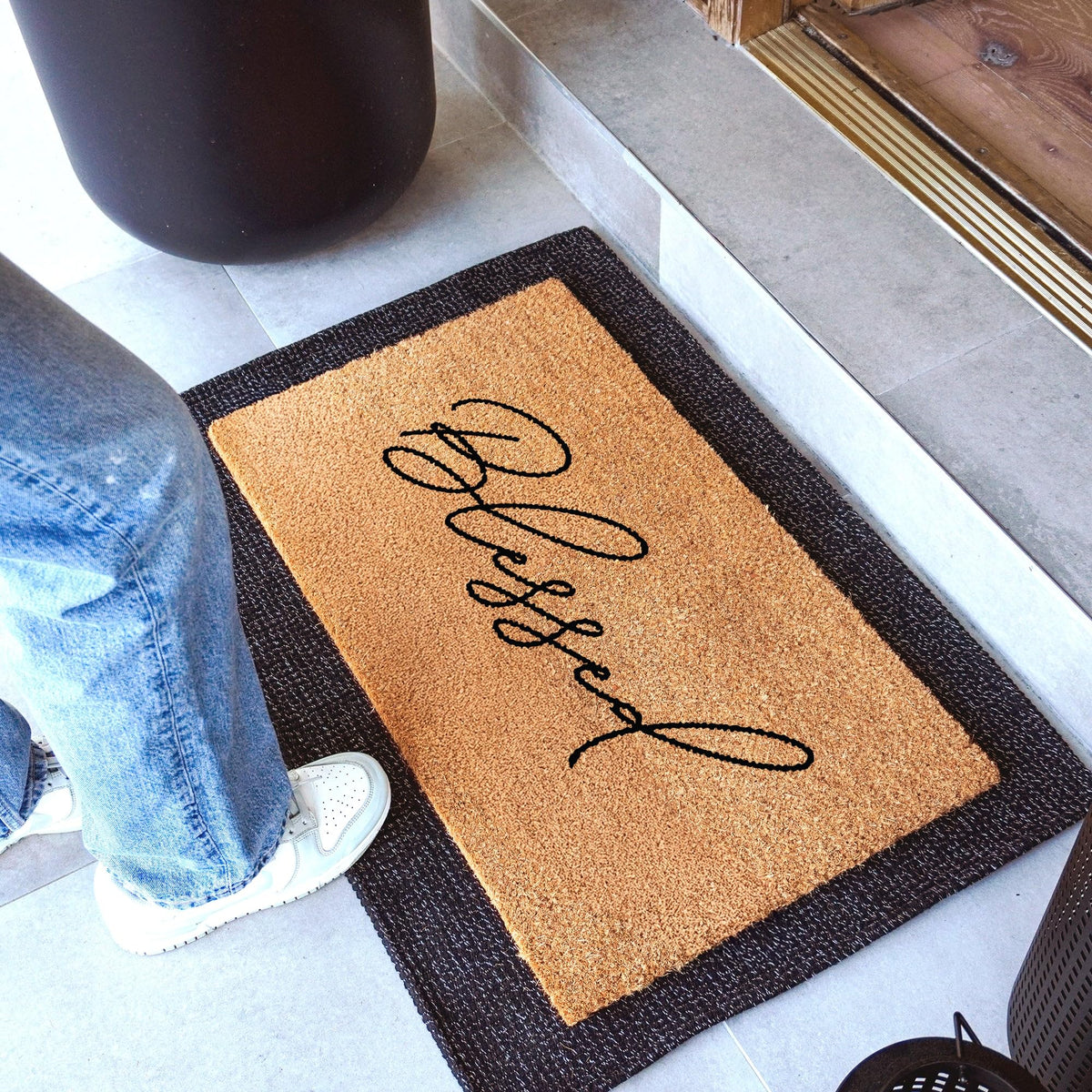 Theodore Magnus doormat with non-slip backing ensures stable entrances.