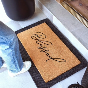 Theodore Magnus doormat with non-slip backing ensures stable entrances.