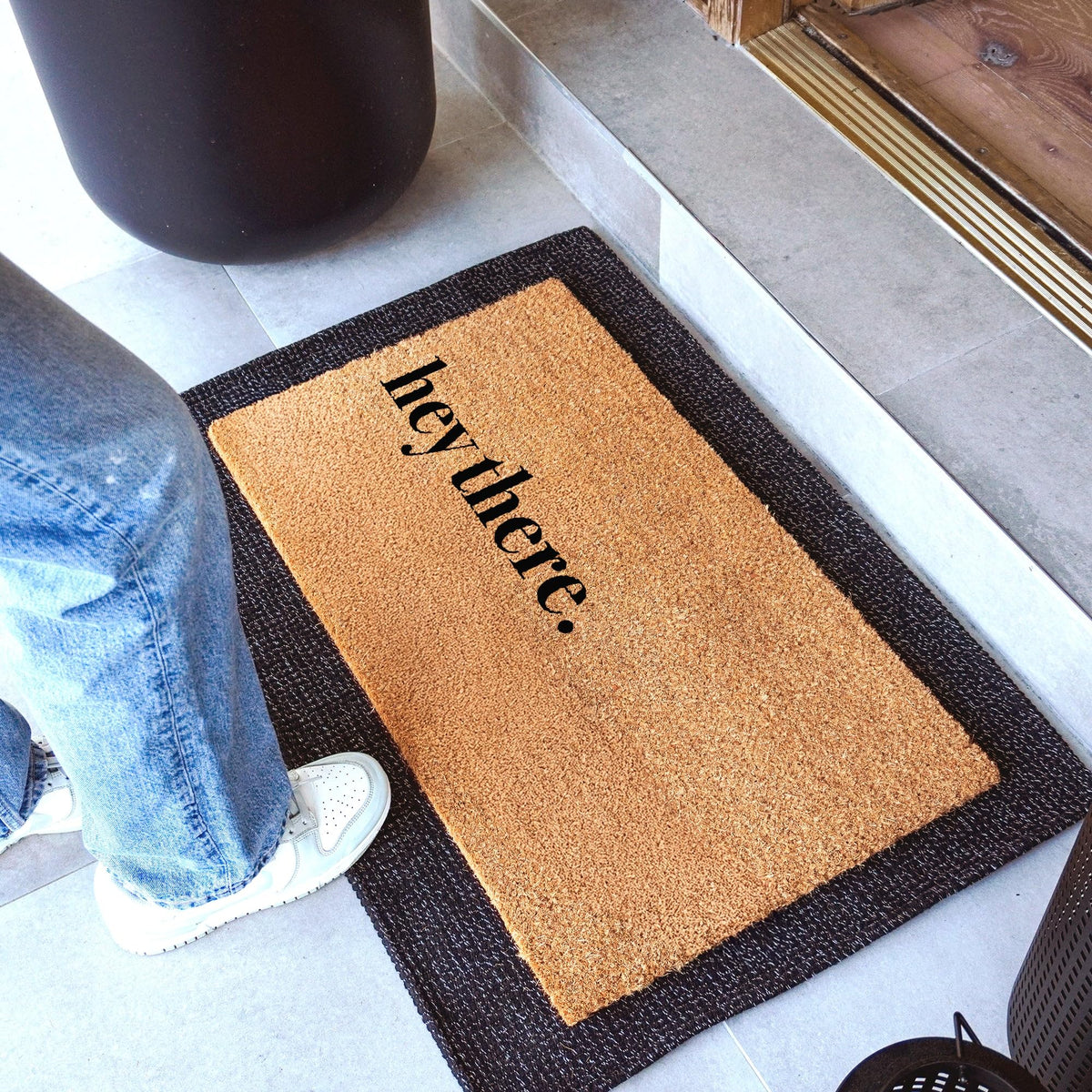 Theodore Magnus door mat non-slip-backing shown for stable footing during busy entrances.