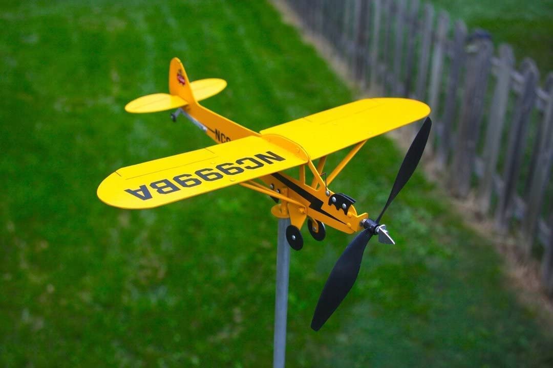 Piper J3 Cub side view highlights detailed metal craftsmanship
