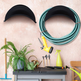 Thyle outdoor hose storage for yard and lawn with durable metal construction.