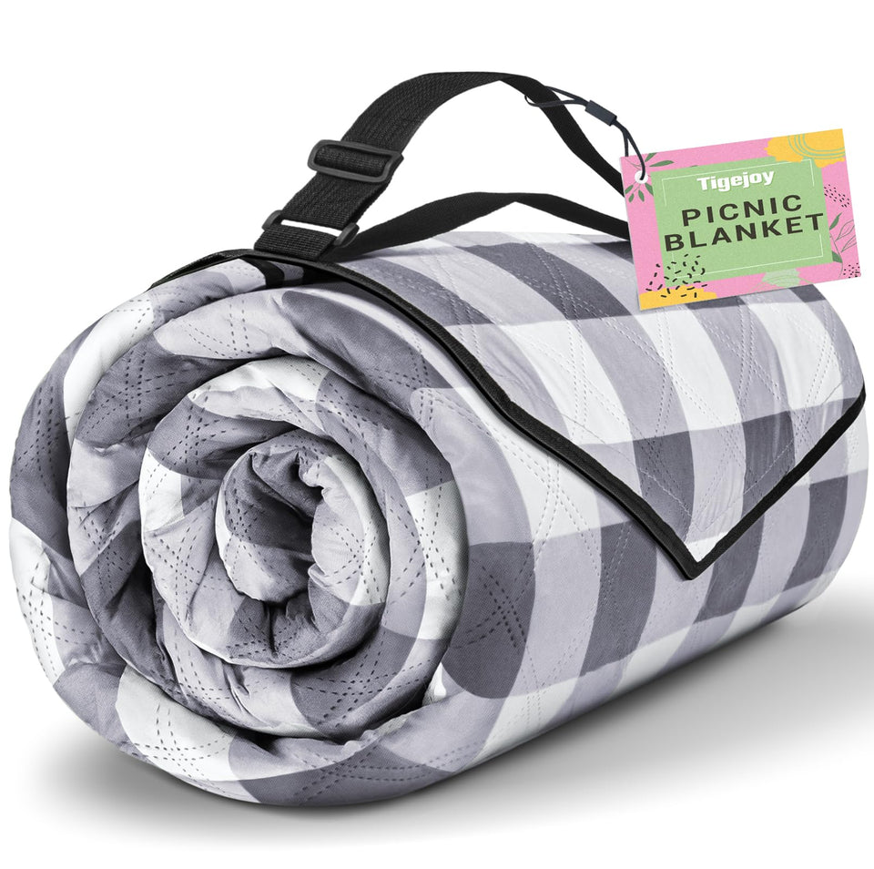 TigeJoy extra-large picnic blanket 80x118 on grass, ideal for family meals and games.