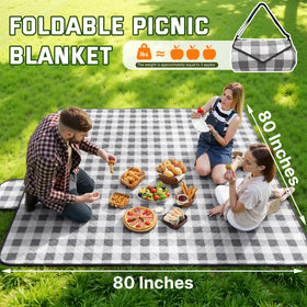 TigeJoy extra-large blanket with diamond-stitch keeps padding evenly distributed on grass.