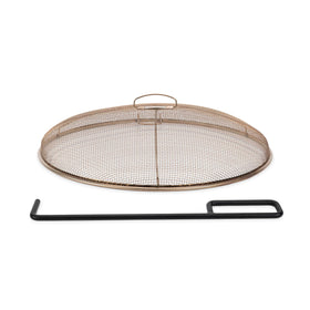 TIKI fire pit screen shows 18-inch diameter, keeping sparks contained for safer fires.
