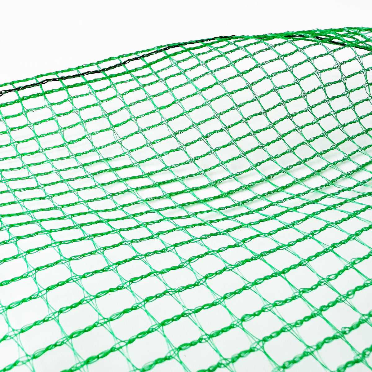 Tilvex poultry net supports safe poultry enclosures in yards.