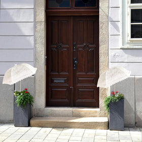 TIMSO umbrella protects potted plants while maintaining natural light balance