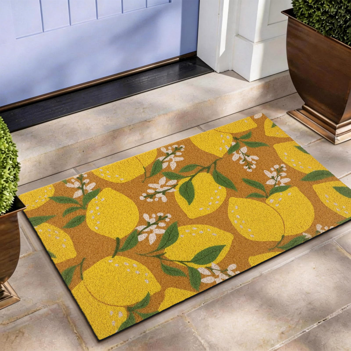 Tinideya lemon mat with floral design at the front door, for a cheerful welcome.