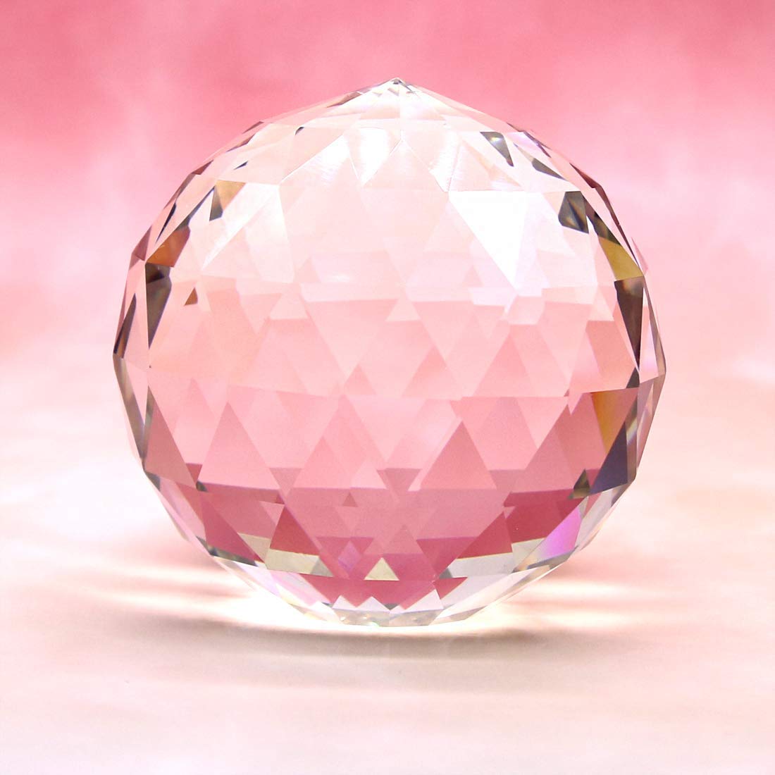 Tirifer prism suncatcher close-up demonstrates craftsmanship and light shower