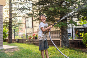 Titan Garden Hose ideal for outdoor watering and car cleaning tasks.