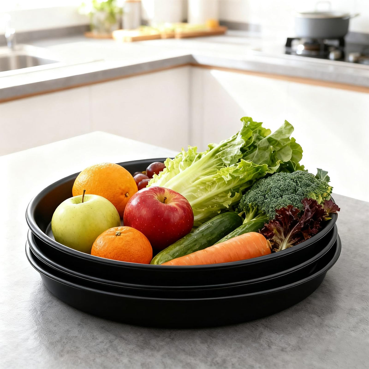 TITE plant saucer outdoors on a patio with plants and water drainage.