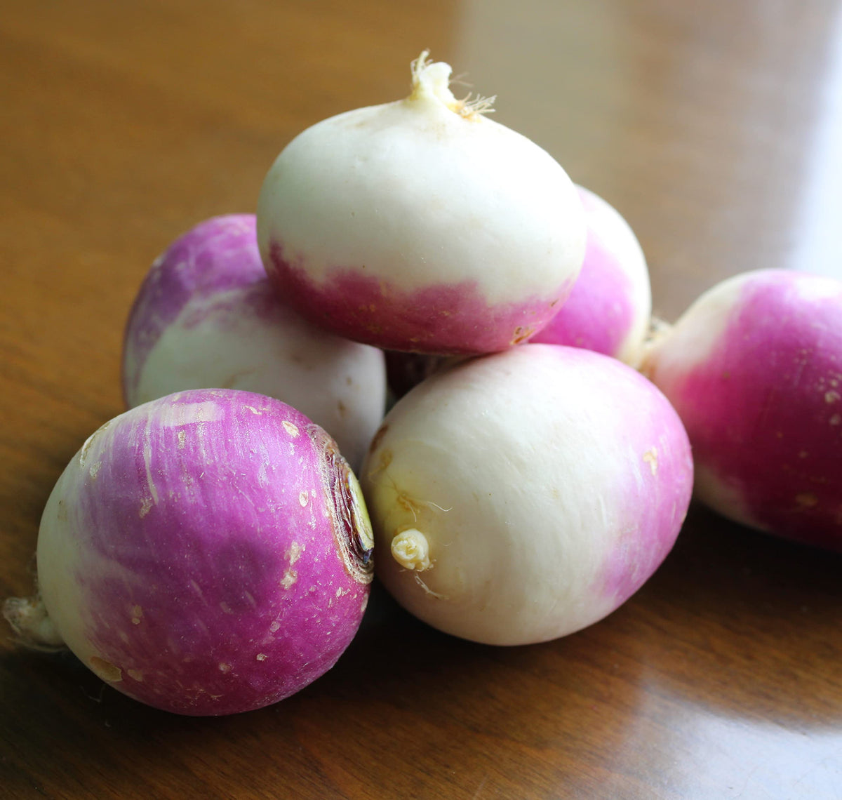 Turnip greens and roots offering dual harvest in a home garden by TKE Farms & Gardens