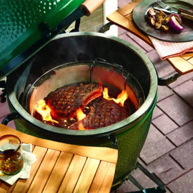 Tmozyar 17-inch diameter grate keeps coals in place during grilling