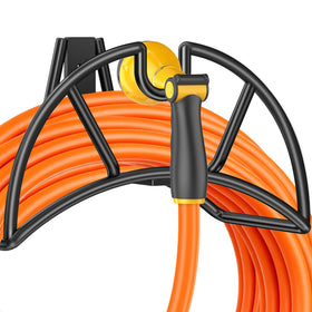 TomCare wall-mounted hose holder on garden wall keeps hoses organized and accessible.