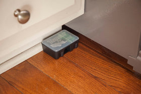 Tomcat Mouse Killer station with bait block inside for targeted mouse exposure.