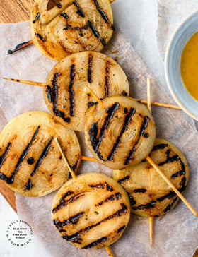 TomorrowSeeds Vidalia onion sliced perfect for fresh salads and sandwiches.