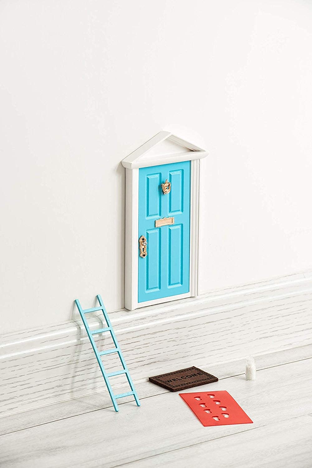 Tonttuovi fairy door open panel invites imaginative play on any desk or wall.