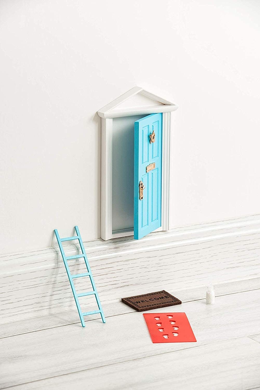 Tonttuovi tooth fairy door measures seven inches, a durable wooden option for fairy visits.
