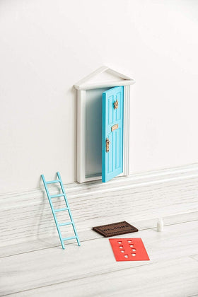 Tonttuovi tooth fairy door measures seven inches, a durable wooden option for fairy visits.
