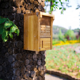 TOOBEETT decorative outdoor insect habitat enhances garden beauty and biodiversity.