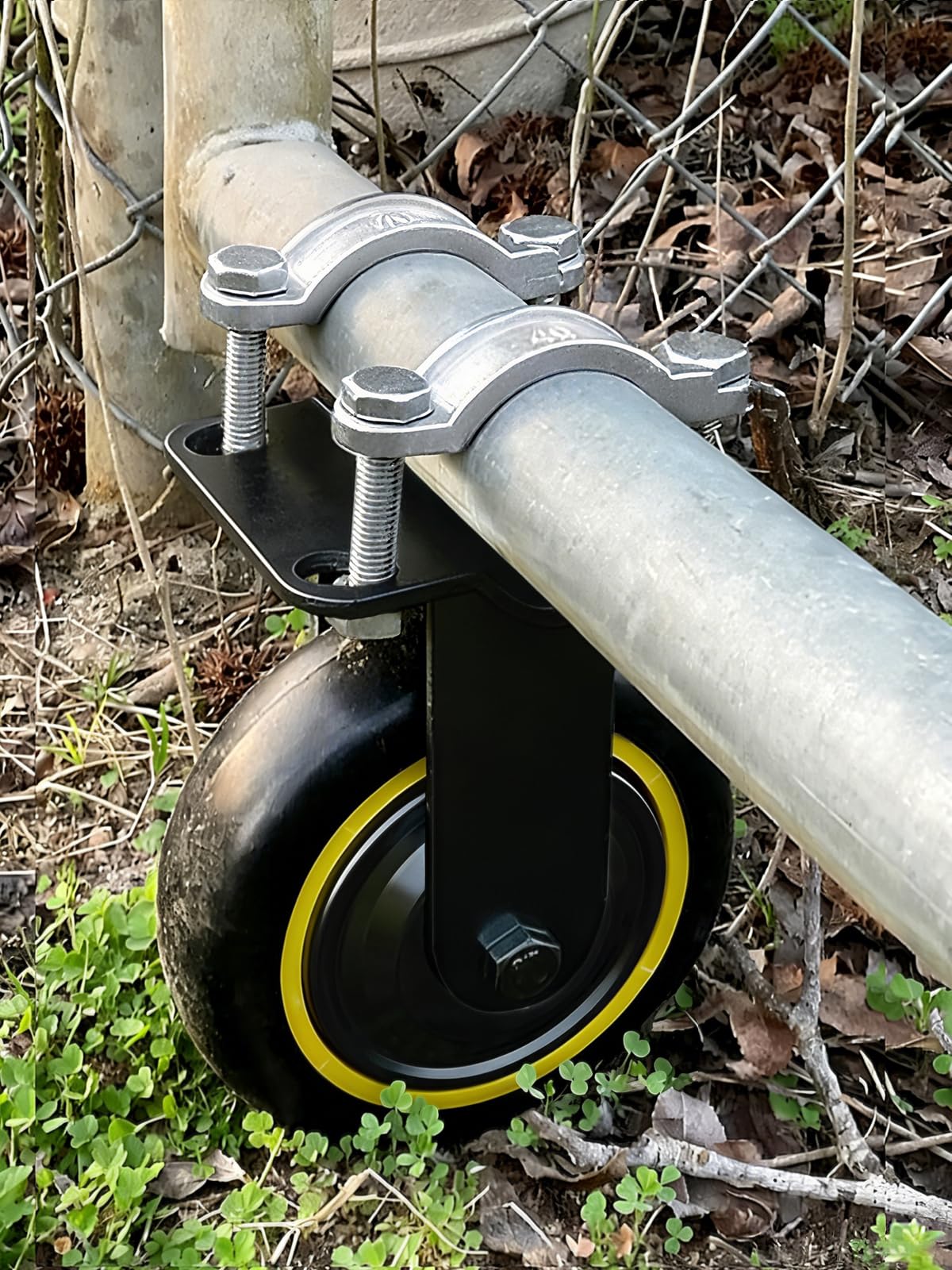 TOOPTATE 6-inch black gate wheel mounted on a metal gate for smooth operation