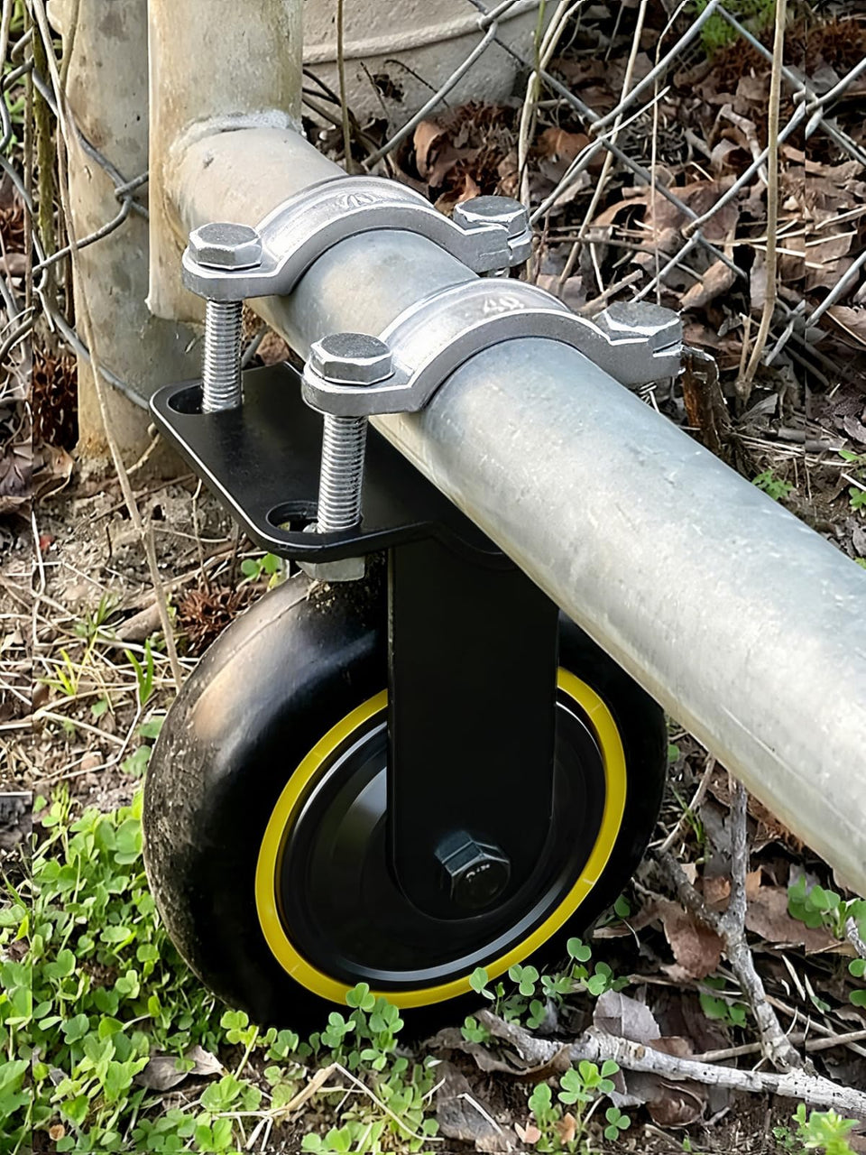 TOOPTATE 6-inch black gate wheel mounted on a metal gate for smooth operation