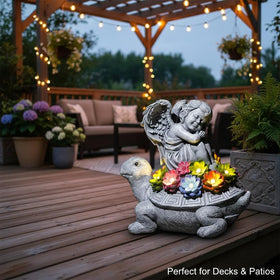 Tooyuart Solar Angel Turtle statue glowing at dusk for garden ambiance.