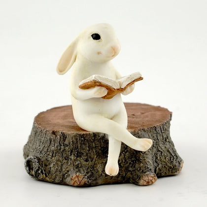 Top Collection bunny reading on stump ivory for indoor fairy garden decor.