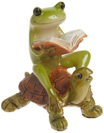 Top Collection frog reads a book atop a turtle statue, adding whimsy to fairy gardens.