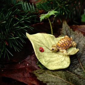 Top Collection hand-painted designer resin detail showcases craftsmanship for elegant display