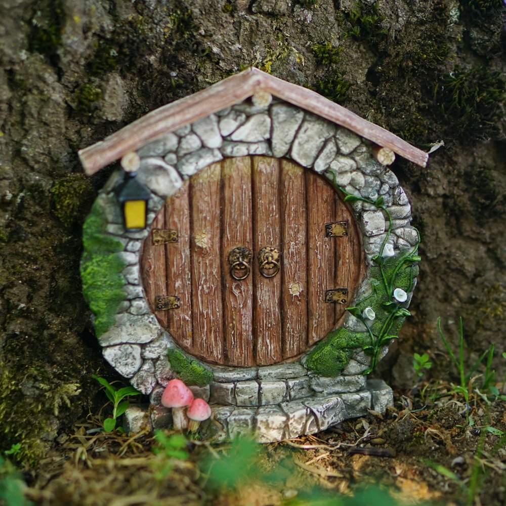 Top Collection miniature fairy garden detail with tiny figures and lush textures